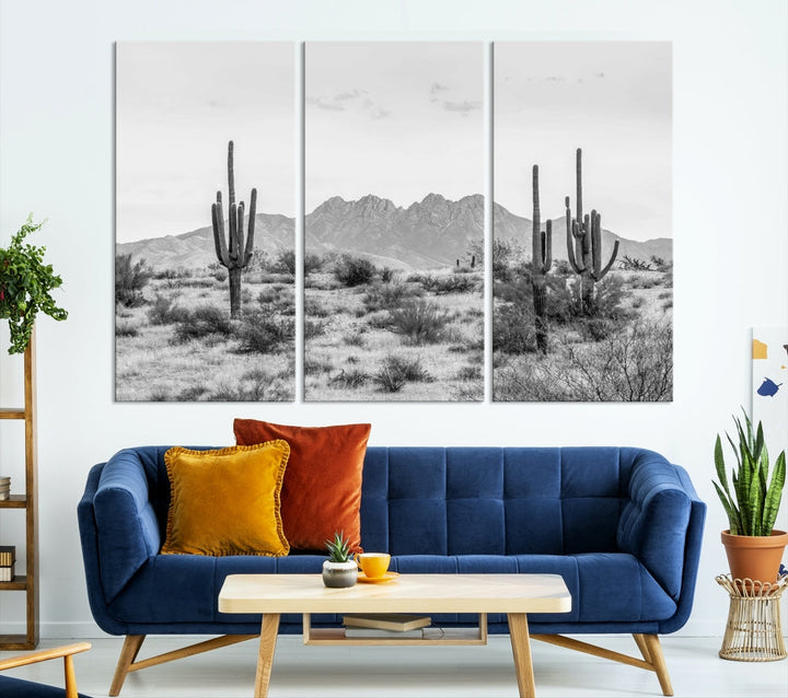 The modern living room showcases the "Black White Arizona Desert Canvas Wall Art Cactus Farmhouse Wall Art," a triptych consisting of gallery-wrapped, museum-quality black-and-white desert landscape photographs featuring cacti.