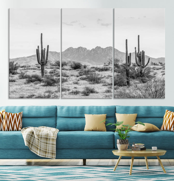 The modern living room showcases the "Black White Arizona Desert Canvas Wall Art Cactus Farmhouse Wall Art," a triptych consisting of gallery-wrapped, museum-quality black-and-white desert landscape photographs featuring cacti.