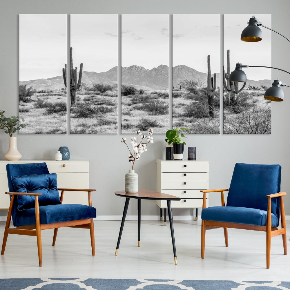 The modern living room showcases the "Black White Arizona Desert Canvas Wall Art Cactus Farmhouse Wall Art," a triptych consisting of gallery-wrapped, museum-quality black-and-white desert landscape photographs featuring cacti.