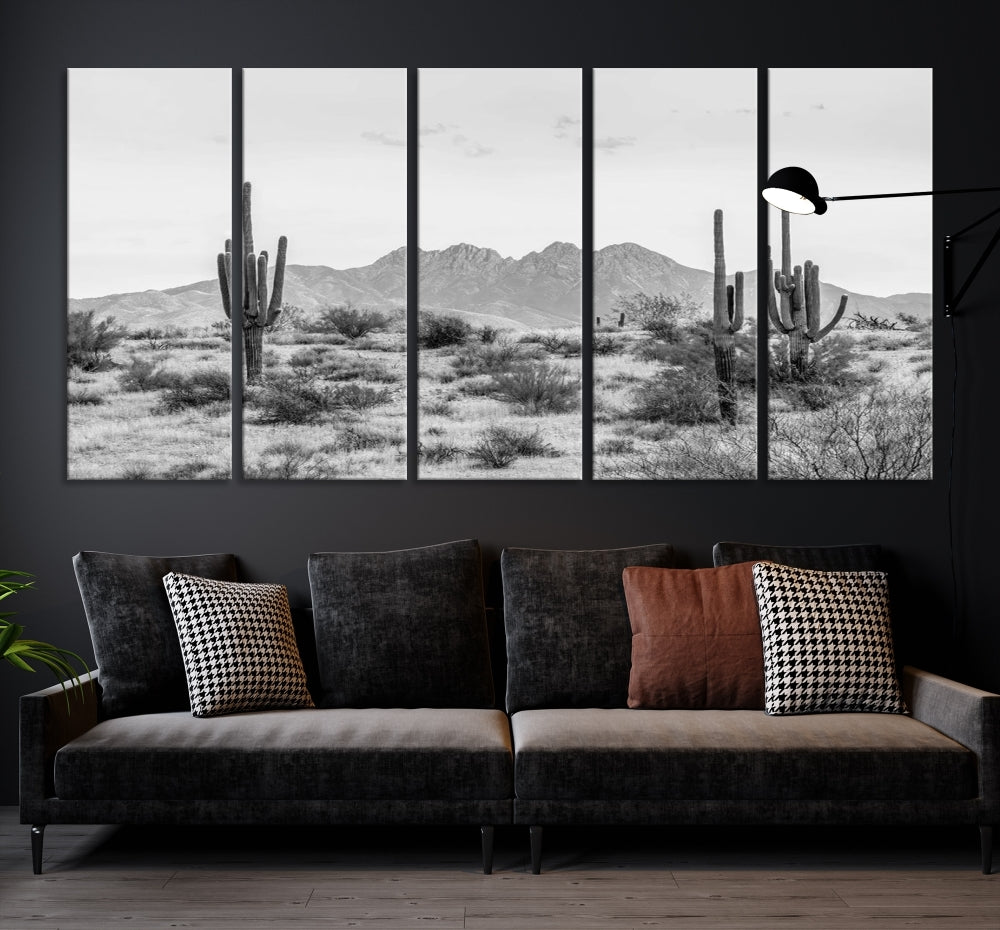 The modern living room showcases the "Black White Arizona Desert Canvas Wall Art Cactus Farmhouse Wall Art," a triptych consisting of gallery-wrapped, museum-quality black-and-white desert landscape photographs featuring cacti.