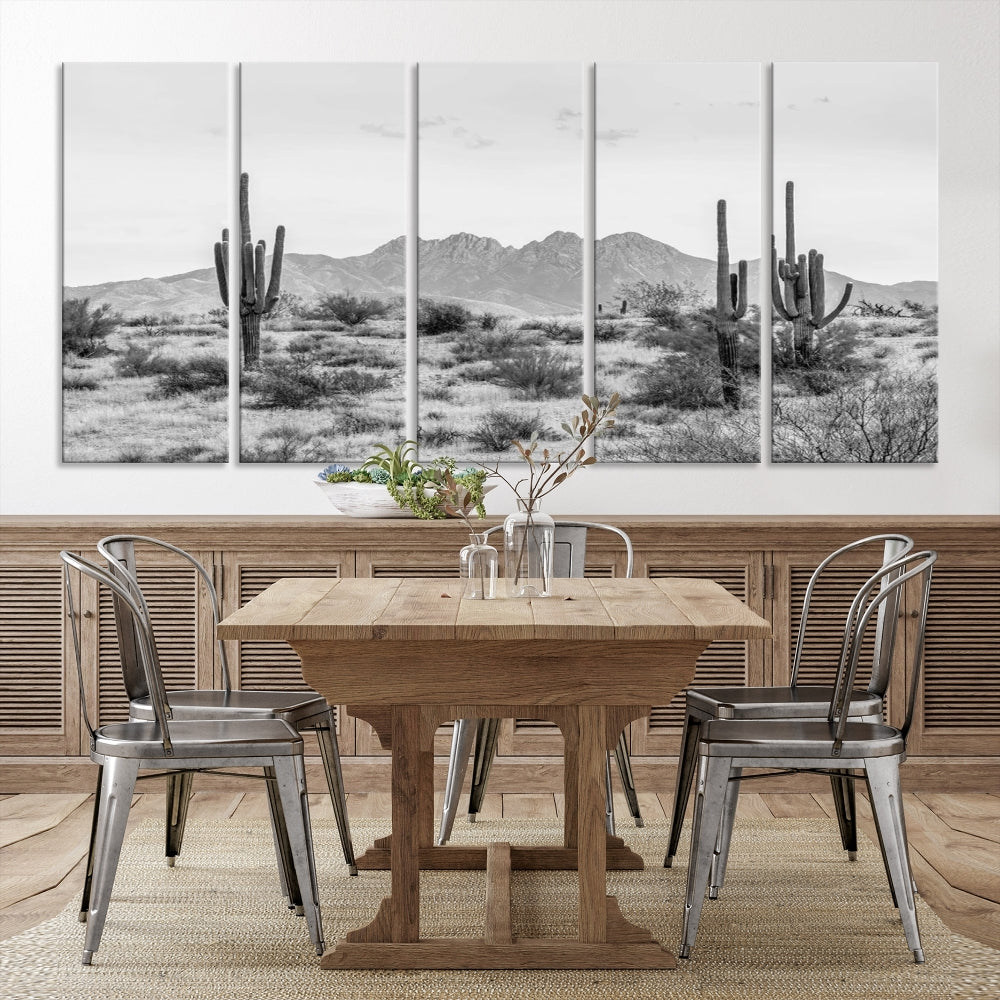 The modern living room showcases the "Black White Arizona Desert Canvas Wall Art Cactus Farmhouse Wall Art," a triptych consisting of gallery-wrapped, museum-quality black-and-white desert landscape photographs featuring cacti.