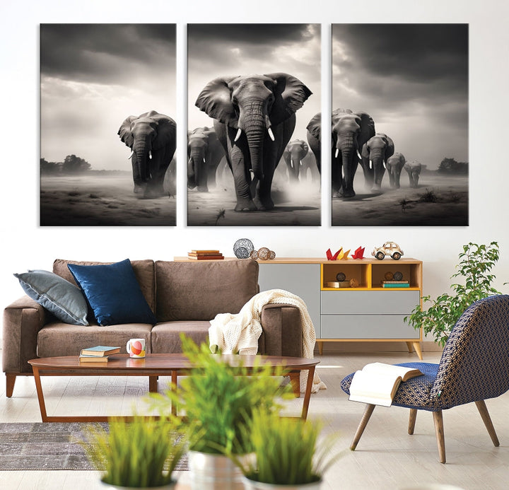 The Black White Elephant Family Wall Art Canvas Print is a stunning triptych artwork featuring elephants marching, displayed on a museum-quality canvas. Enjoy its UV-protective coating that ensures lasting beauty.