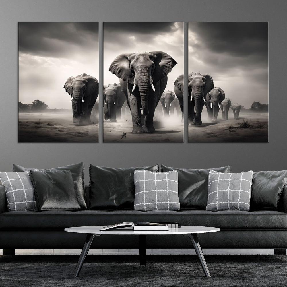 The Black White Elephant Family Wall Art Canvas Print is a stunning triptych artwork featuring elephants marching, displayed on a museum-quality canvas. Enjoy its UV-protective coating that ensures lasting beauty.