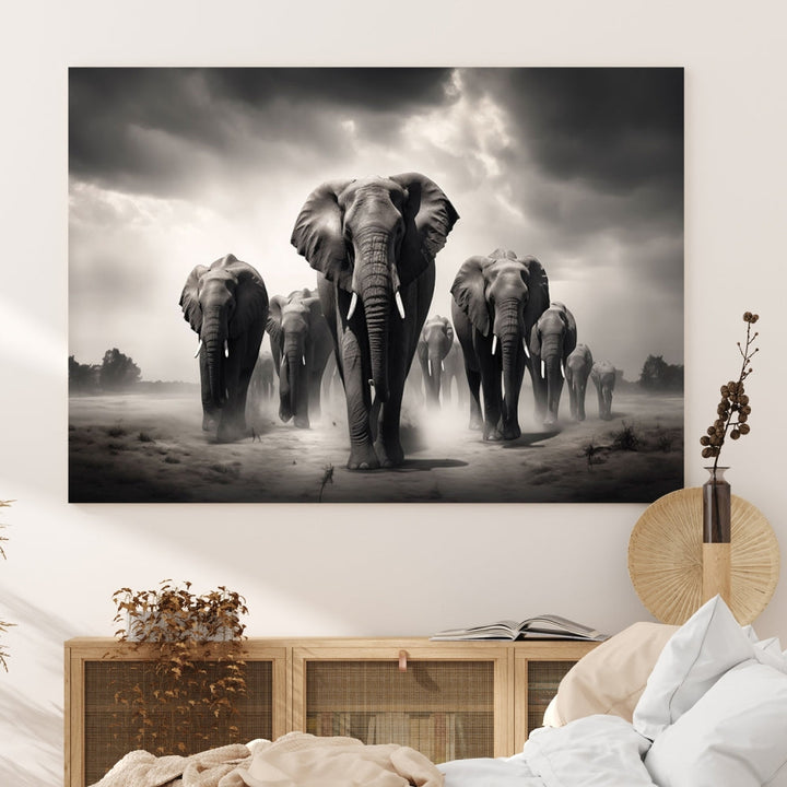 The Black White Elephant Family Wall Art Canvas Print is a stunning triptych artwork featuring elephants marching, displayed on a museum-quality canvas. Enjoy its UV-protective coating that ensures lasting beauty.