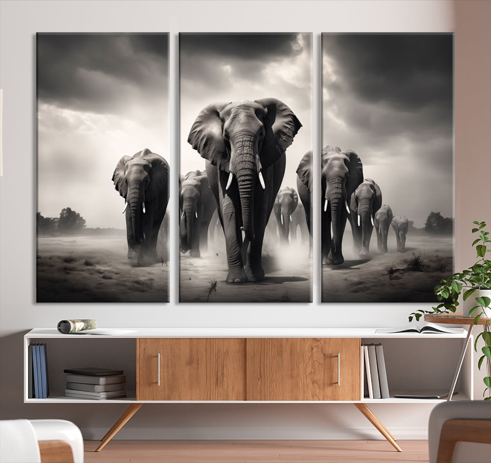 The Black White Elephant Family Wall Art Canvas Print is a stunning triptych artwork featuring elephants marching, displayed on a museum-quality canvas. Enjoy its UV-protective coating that ensures lasting beauty.