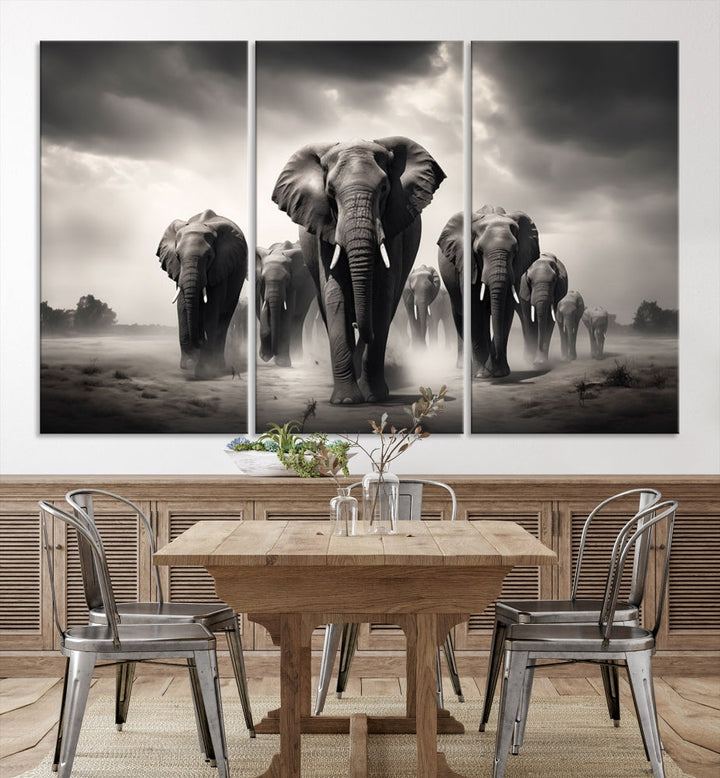 The Black White Elephant Family Wall Art Canvas Print is a stunning triptych artwork featuring elephants marching, displayed on a museum-quality canvas. Enjoy its UV-protective coating that ensures lasting beauty.