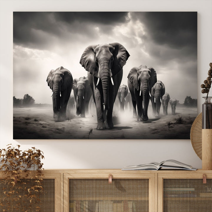 The Black White Elephant Family Wall Art Canvas Print is a stunning triptych artwork featuring elephants marching, displayed on a museum-quality canvas. Enjoy its UV-protective coating that ensures lasting beauty.