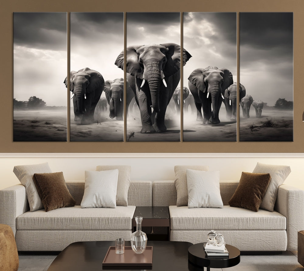 The Black White Elephant Family Wall Art Canvas Print is a stunning triptych artwork featuring elephants marching, displayed on a museum-quality canvas. Enjoy its UV-protective coating that ensures lasting beauty.