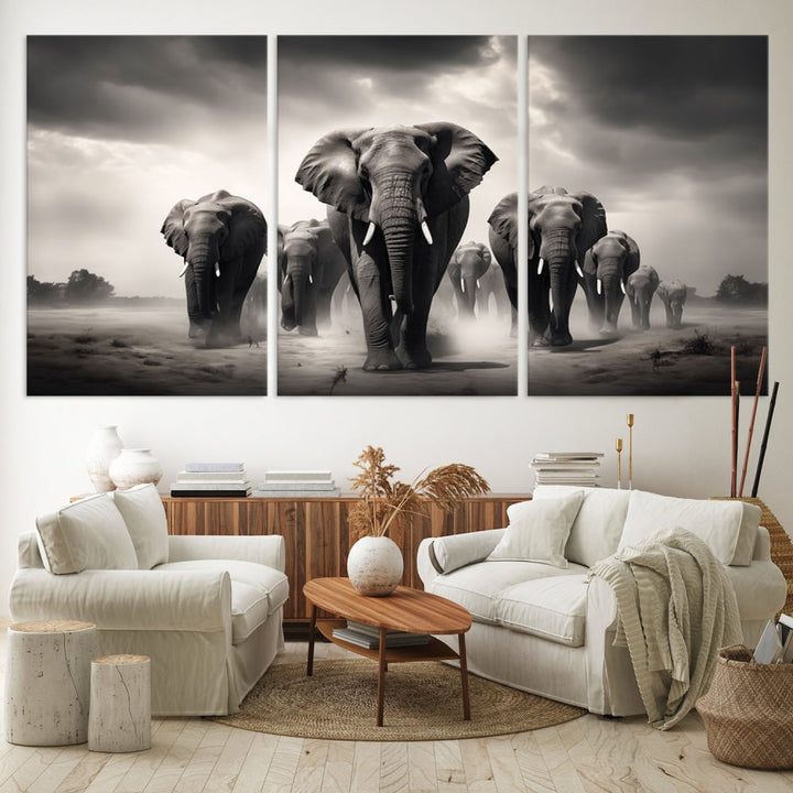 The Black White Elephant Family Wall Art Canvas Print is a stunning triptych artwork featuring elephants marching, displayed on a museum-quality canvas. Enjoy its UV-protective coating that ensures lasting beauty.