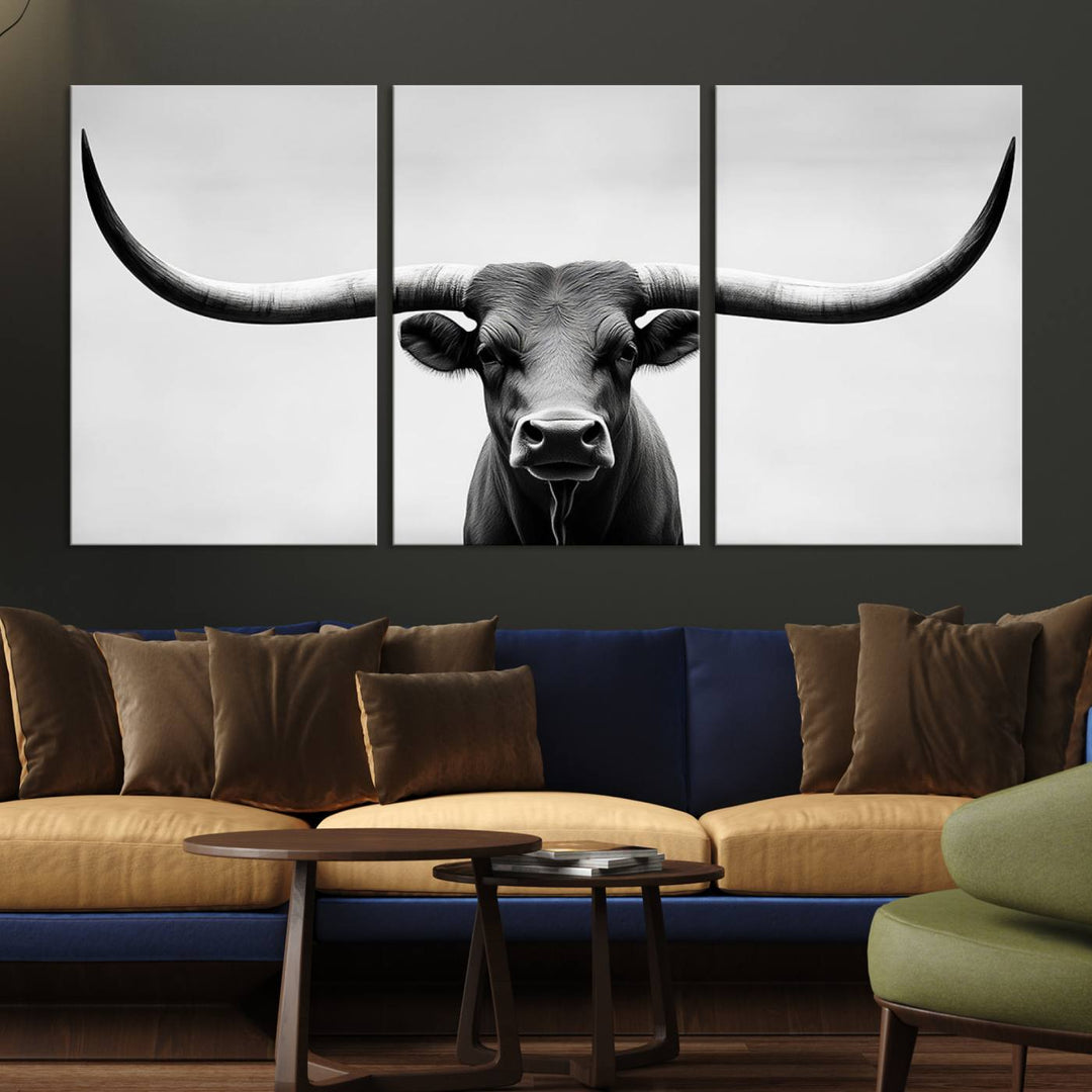 A striking Black White Texas Longhorn Bull Horns Wall Art Canvas Print adorns the wall, creating a stylish living room that seamlessly blends contemporary flair with rustic farmhouse charm.