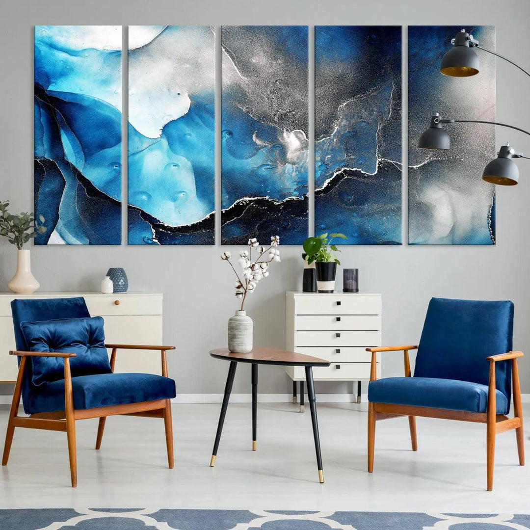 The Blue and Black Marble Fluid Effect Wall Art Abstract Canvas Prints feature three dynamic swirling patterns in blue, black, and white. Crafted on museum-quality canvases and enhanced with a UV-protective coating, these prints maintain their vibrant allure over time.