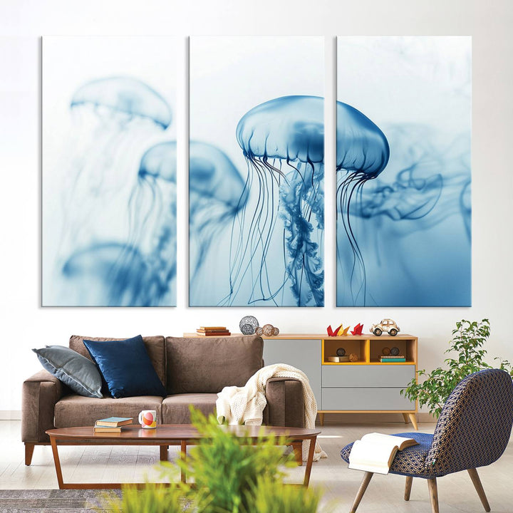 A breathtaking triptych of the Blue Jellyfish Wall Art Canvas Print decorates the space, beautifully highlighted by an overhead lamp. Each canvas is created on museum-quality material using high-resolution printing and includes a UV-protective coating to ensure long-lasting vibrancy.