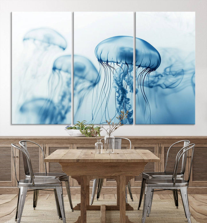 A breathtaking triptych of the Blue Jellyfish Wall Art Canvas Print decorates the space, beautifully highlighted by an overhead lamp. Each canvas is created on museum-quality material using high-resolution printing and includes a UV-protective coating to ensure long-lasting vibrancy.