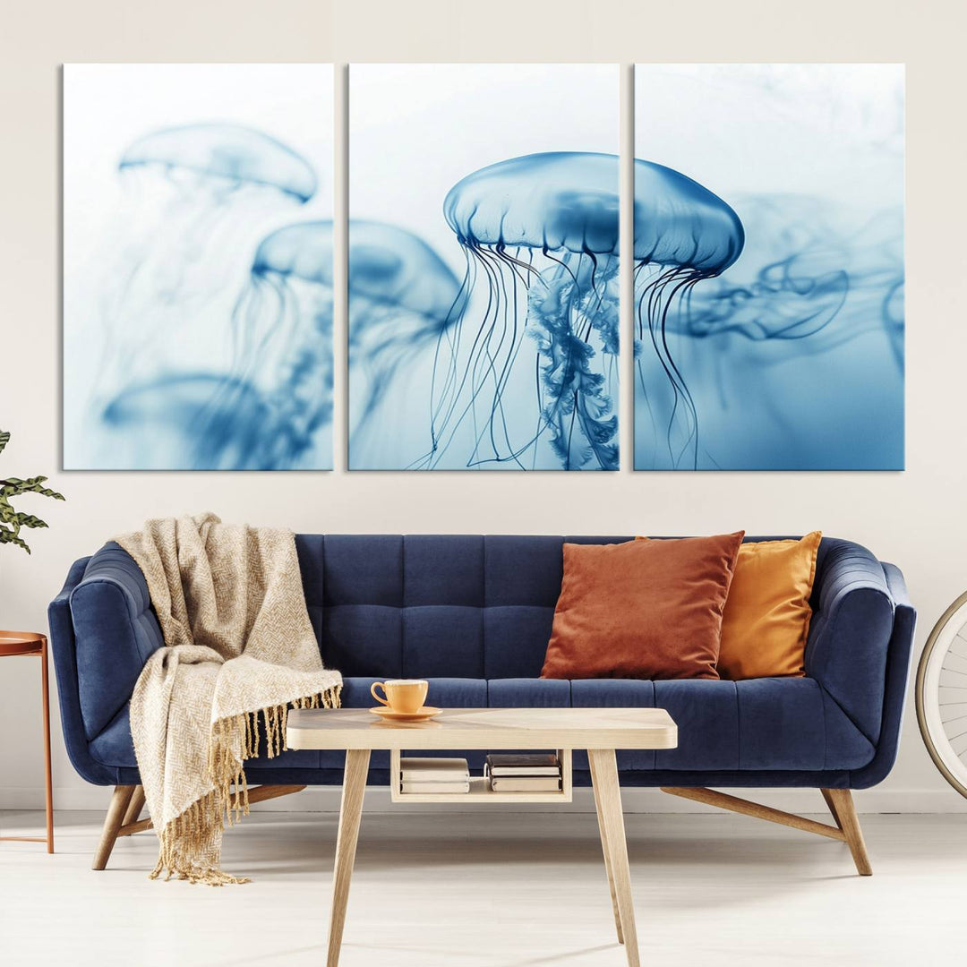 A breathtaking triptych of the Blue Jellyfish Wall Art Canvas Print decorates the space, beautifully highlighted by an overhead lamp. Each canvas is created on museum-quality material using high-resolution printing and includes a UV-protective coating to ensure long-lasting vibrancy.