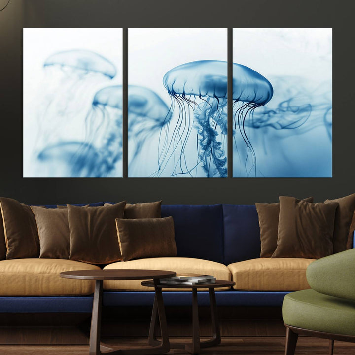 A breathtaking triptych of the Blue Jellyfish Wall Art Canvas Print decorates the space, beautifully highlighted by an overhead lamp. Each canvas is created on museum-quality material using high-resolution printing and includes a UV-protective coating to ensure long-lasting vibrancy.