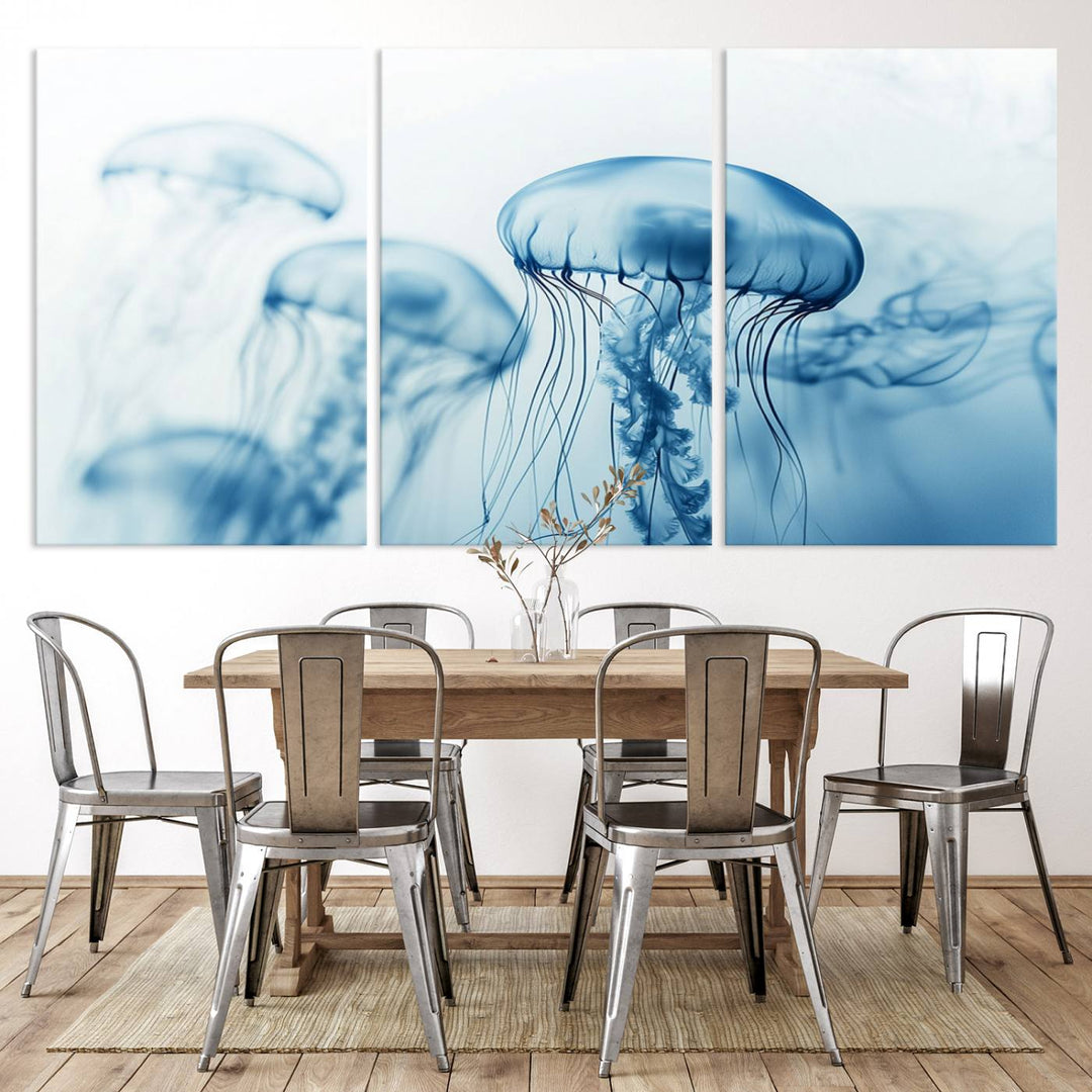 A breathtaking triptych of the Blue Jellyfish Wall Art Canvas Print decorates the space, beautifully highlighted by an overhead lamp. Each canvas is created on museum-quality material using high-resolution printing and includes a UV-protective coating to ensure long-lasting vibrancy.