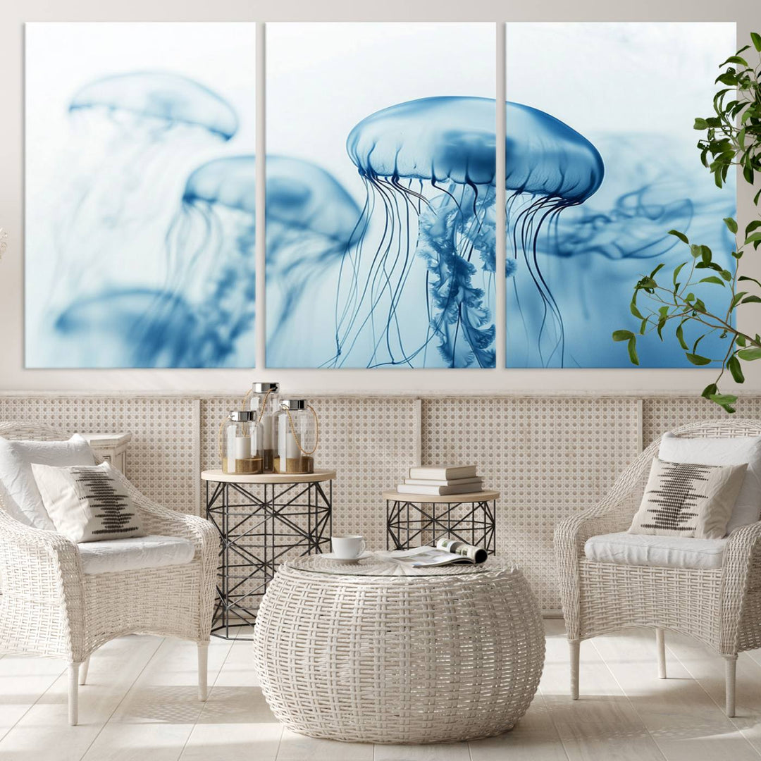 A breathtaking triptych of the Blue Jellyfish Wall Art Canvas Print decorates the space, beautifully highlighted by an overhead lamp. Each canvas is created on museum-quality material using high-resolution printing and includes a UV-protective coating to ensure long-lasting vibrancy.