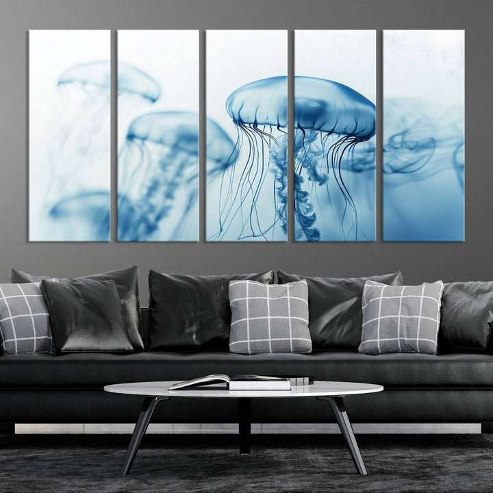 A breathtaking triptych of the Blue Jellyfish Wall Art Canvas Print decorates the space, beautifully highlighted by an overhead lamp. Each canvas is created on museum-quality material using high-resolution printing and includes a UV-protective coating to ensure long-lasting vibrancy.