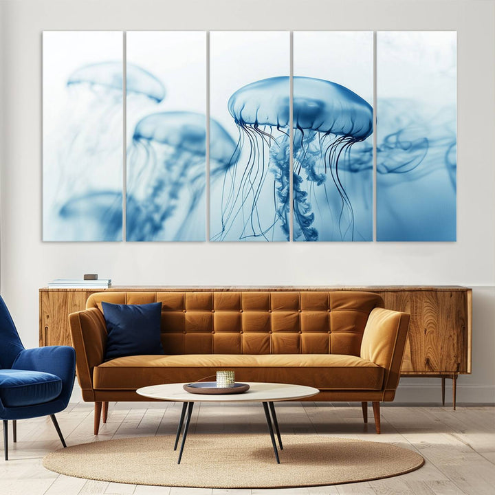 A breathtaking triptych of the Blue Jellyfish Wall Art Canvas Print decorates the space, beautifully highlighted by an overhead lamp. Each canvas is created on museum-quality material using high-resolution printing and includes a UV-protective coating to ensure long-lasting vibrancy.