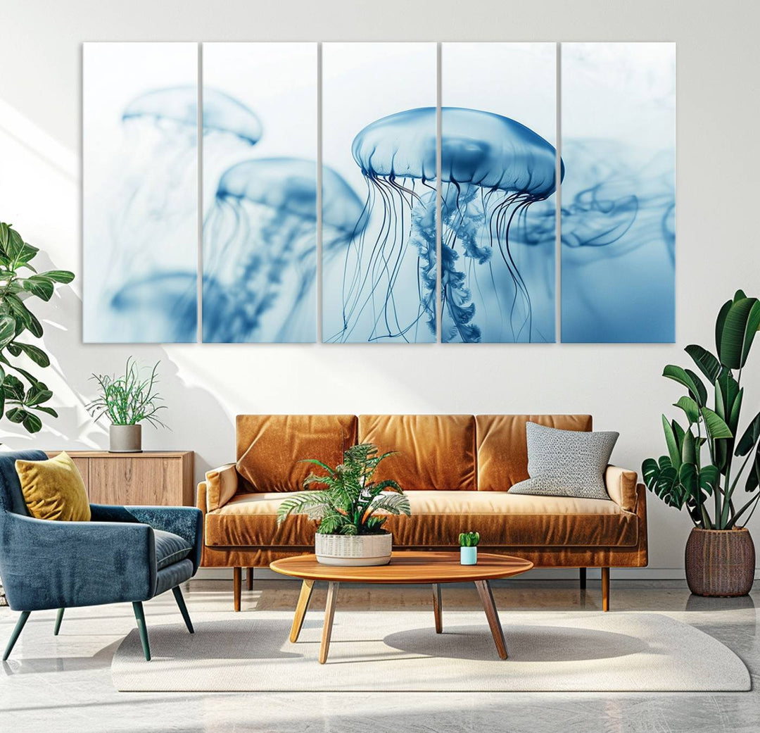 A breathtaking triptych of the Blue Jellyfish Wall Art Canvas Print decorates the space, beautifully highlighted by an overhead lamp. Each canvas is created on museum-quality material using high-resolution printing and includes a UV-protective coating to ensure long-lasting vibrancy.