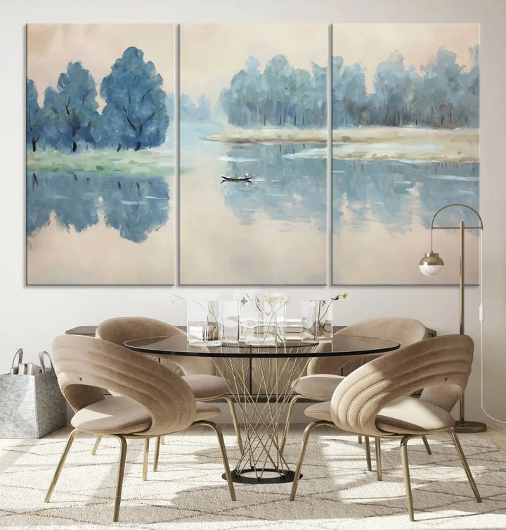 The triptych canvas print, "Blue Trees and Water Reflection Landscape," showcases a serene lake and boat scene through giclee printing. The blue trees reflecting on the water create a calming ambiance, making it an ideal choice for nature lovers.