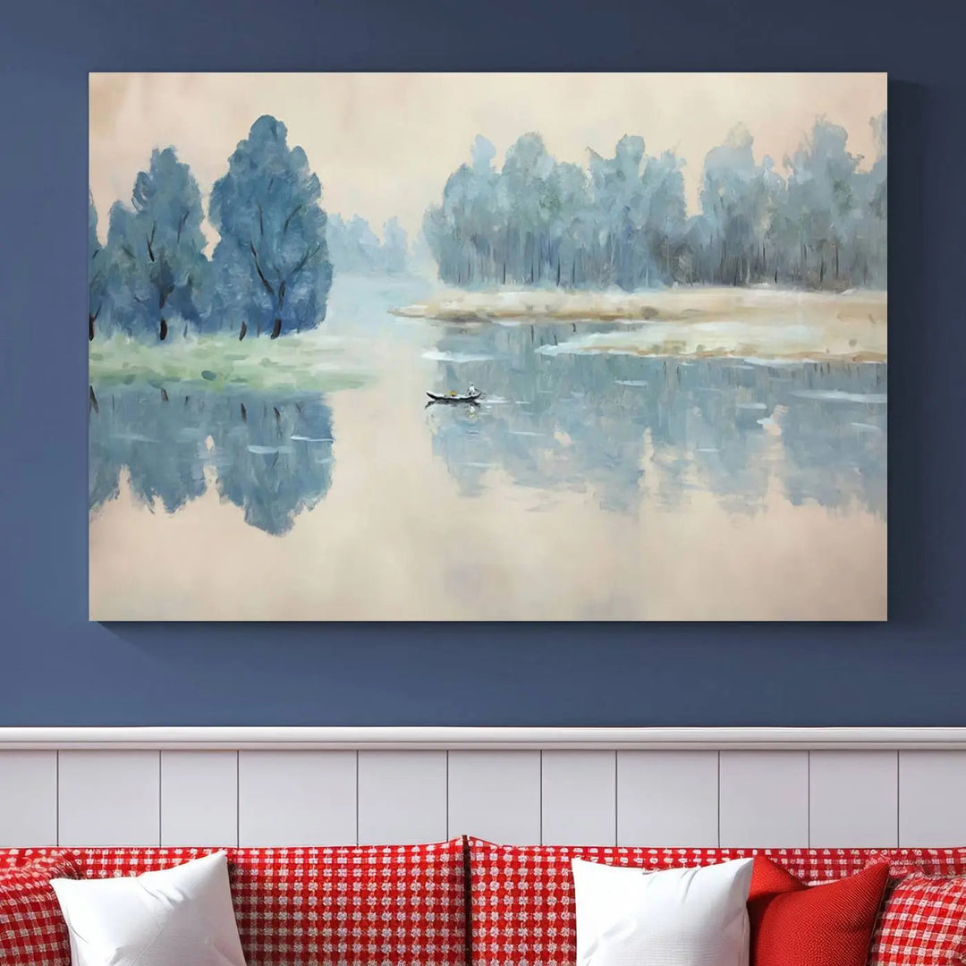 The triptych canvas print, "Blue Trees and Water Reflection Landscape," showcases a serene lake and boat scene through giclee printing. The blue trees reflecting on the water create a calming ambiance, making it an ideal choice for nature lovers.