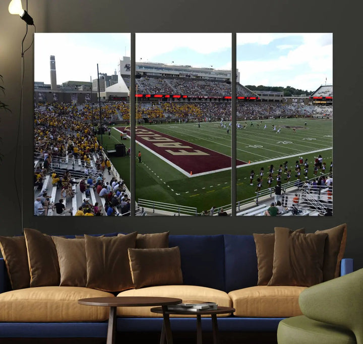 The living room is enhanced by the Boston College Eagles Football Team Print, showcasing a multi-panel wall art of the Boston Alumni Stadium filled with spectators. This piece is crafted on museum-quality canvas using high-resolution printing by a professional craftsman.