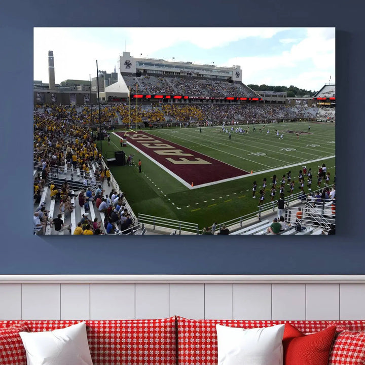 The living room is enhanced by the Boston College Eagles Football Team Print, showcasing a multi-panel wall art of the Boston Alumni Stadium filled with spectators. This piece is crafted on museum-quality canvas using high-resolution printing by a professional craftsman.