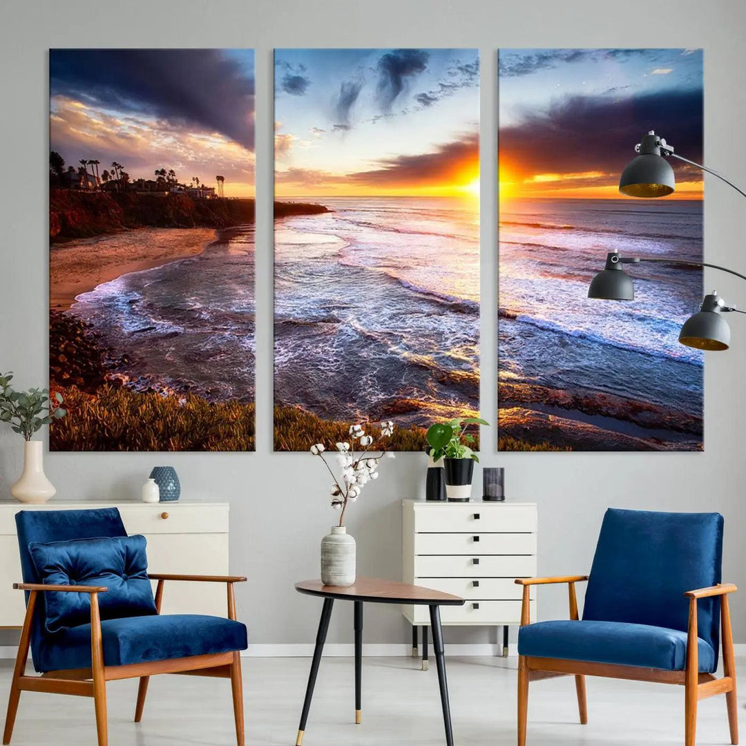 The California Coastline Sunset Canvas Art, featuring ocean waves crashing on cliffs, is presented as a large, framed giclee canvas print. This stunning piece is the perfect complement to any coastal interior.