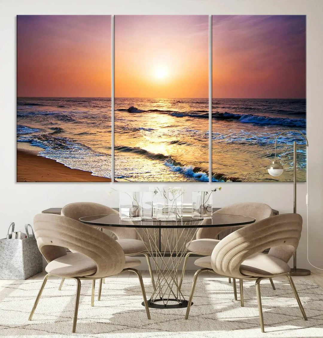 A cozy living room features the breathtaking California Coastline Sunset Canvas Art, capturing ocean waves crashing on cliffs to create the perfect coastal ambiance.