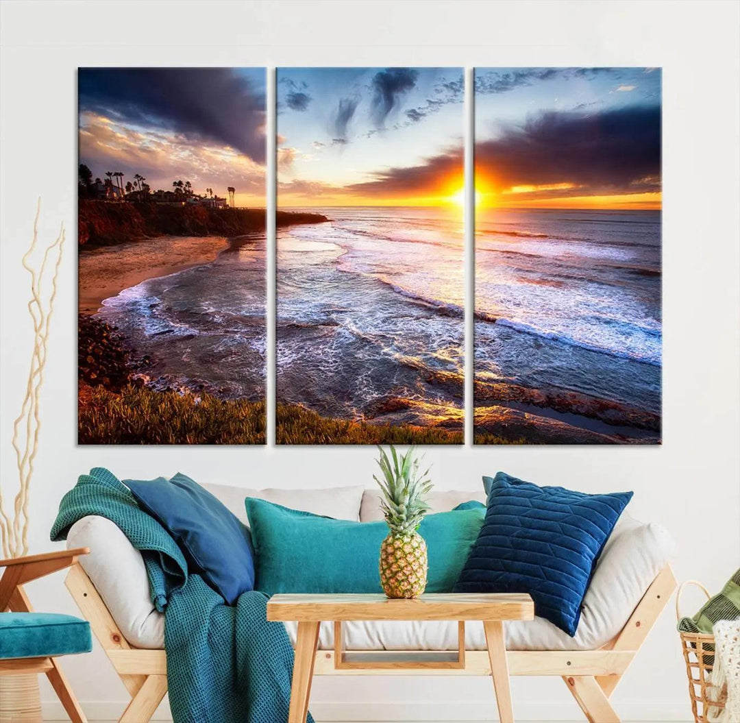 The California Coastline Sunset Canvas Art, featuring ocean waves crashing on cliffs, is presented as a large, framed giclee canvas print. This stunning piece is the perfect complement to any coastal interior.