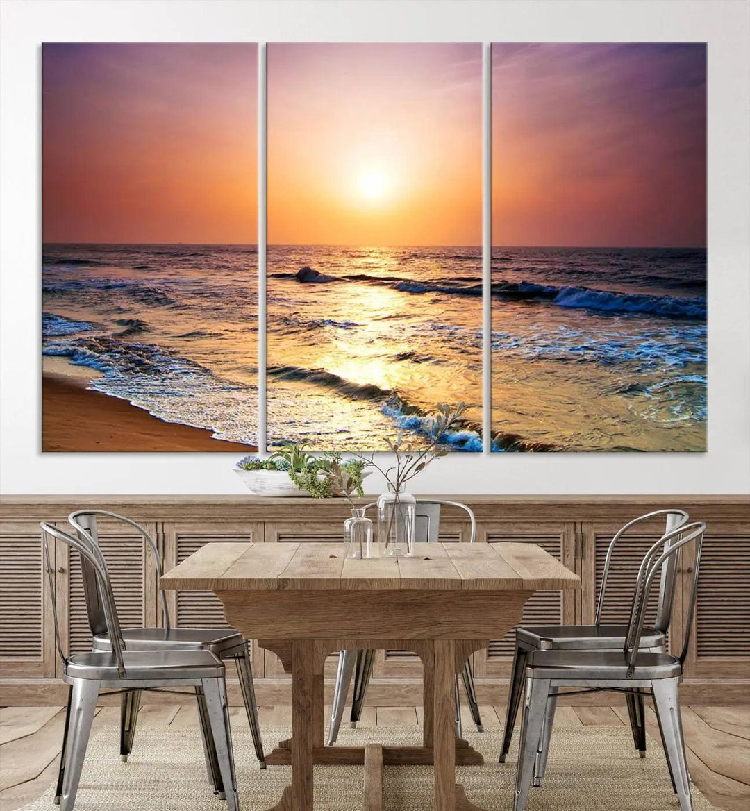 A cozy living room features the breathtaking California Coastline Sunset Canvas Art, capturing ocean waves crashing on cliffs to create the perfect coastal ambiance.