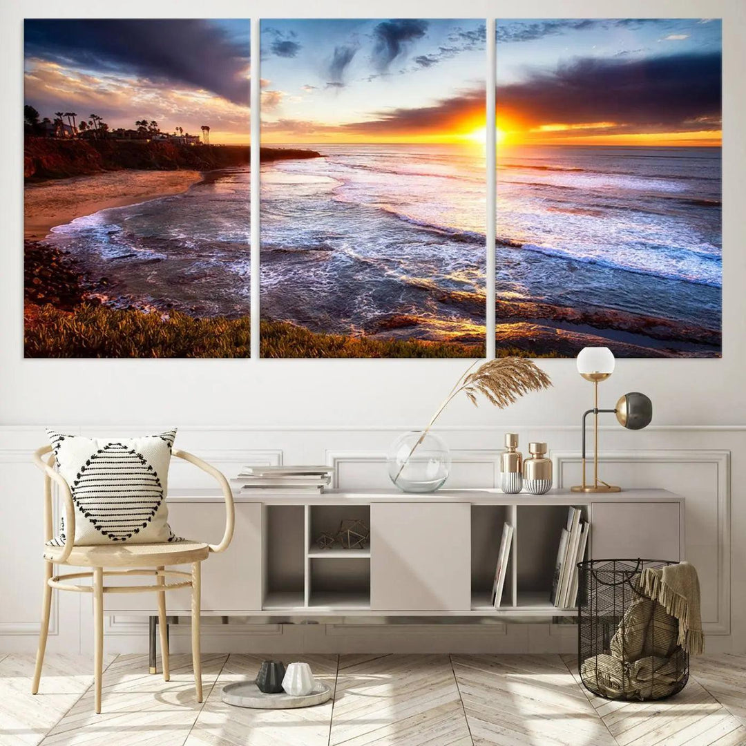 The California Coastline Sunset Canvas Art, featuring ocean waves crashing on cliffs, is presented as a large, framed giclee canvas print. This stunning piece is the perfect complement to any coastal interior.