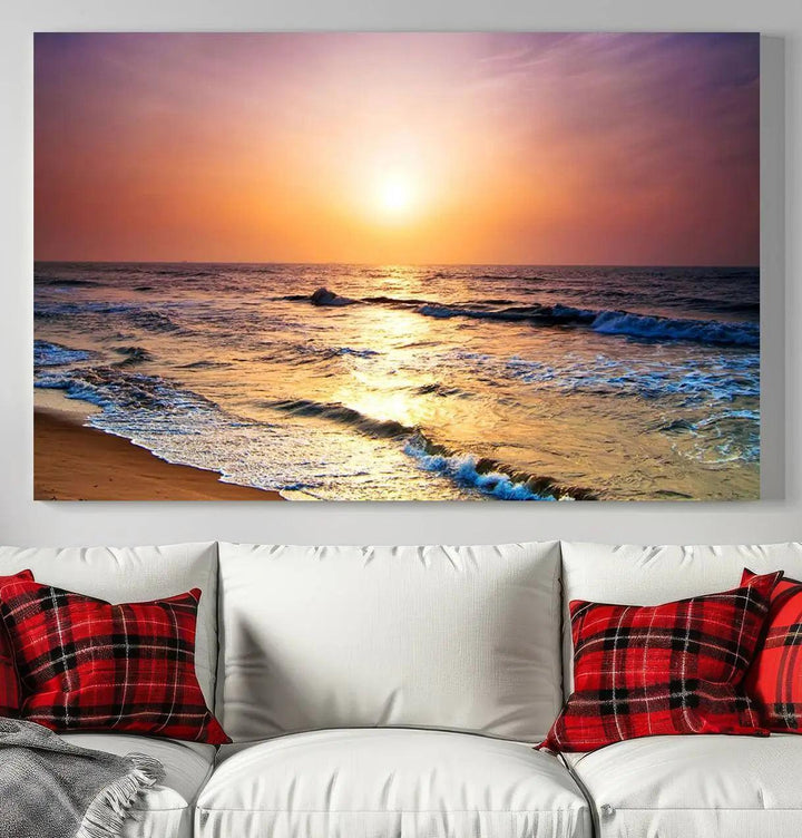 A cozy living room features the breathtaking California Coastline Sunset Canvas Art, capturing ocean waves crashing on cliffs to create the perfect coastal ambiance.