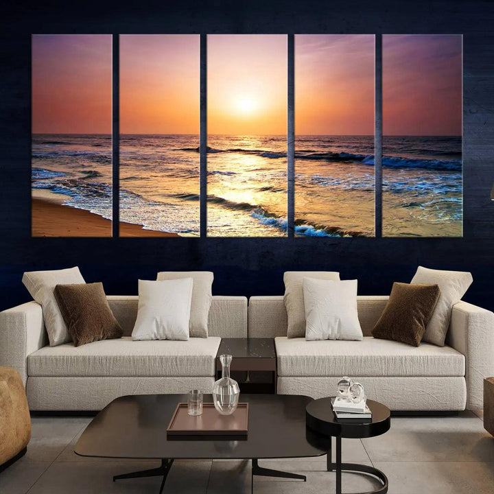 A cozy living room features the breathtaking California Coastline Sunset Canvas Art, capturing ocean waves crashing on cliffs to create the perfect coastal ambiance.