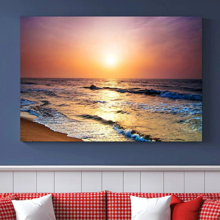 A cozy living room features the breathtaking California Coastline Sunset Canvas Art, capturing ocean waves crashing on cliffs to create the perfect coastal ambiance.