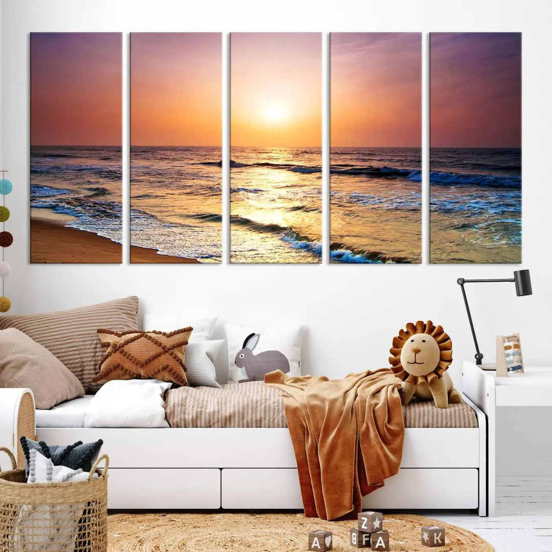 A cozy living room features the breathtaking California Coastline Sunset Canvas Art, capturing ocean waves crashing on cliffs to create the perfect coastal ambiance.