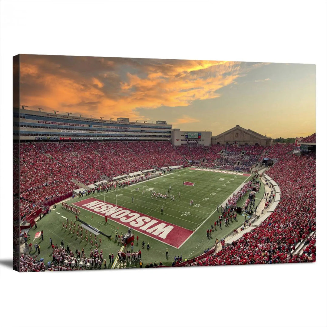 A captivating Camp Randall Stadium Wisconsin Badgers Large Wall Art Canvas Print, showcasing a sunset scene, beautifully captures the essence of college football spirit.