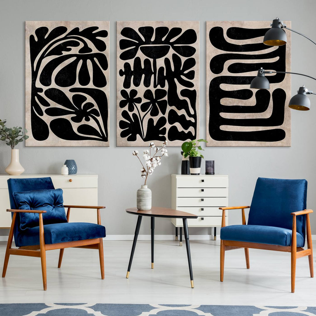 The living room showcases a museum-quality Canvas Print Wall Art Abstract Illustrs Art Boho with black and white abstract designs. The artwork is ready to hang and comes with a UV-protective coating to maintain its lasting vibrancy.