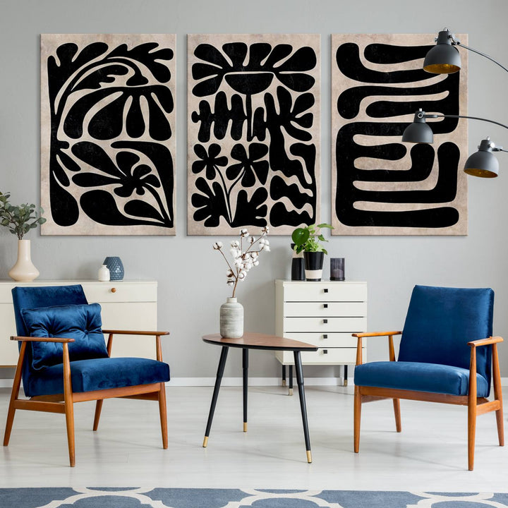 The living room showcases a museum-quality Canvas Print Wall Art Abstract Illustrs Art Boho with black and white abstract designs. The artwork is ready to hang and comes with a UV-protective coating to maintain its lasting vibrancy.