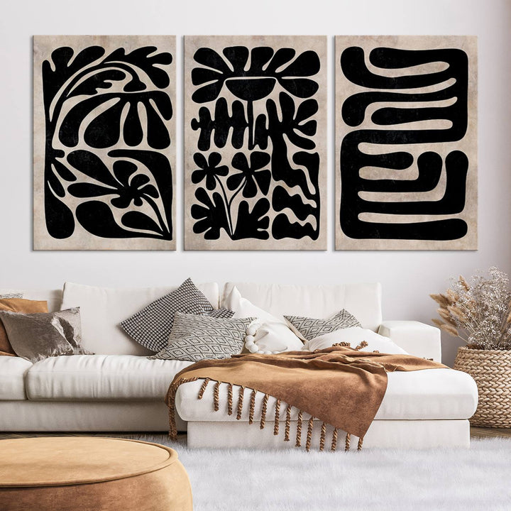 The living room showcases a museum-quality Canvas Print Wall Art Abstract Illustrs Art Boho with black and white abstract designs. The artwork is ready to hang and comes with a UV-protective coating to maintain its lasting vibrancy.