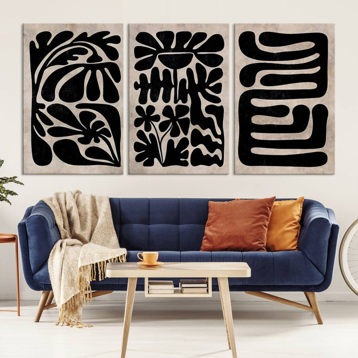 The living room showcases a museum-quality Canvas Print Wall Art Abstract Illustrs Art Boho with black and white abstract designs. The artwork is ready to hang and comes with a UV-protective coating to maintain its lasting vibrancy.