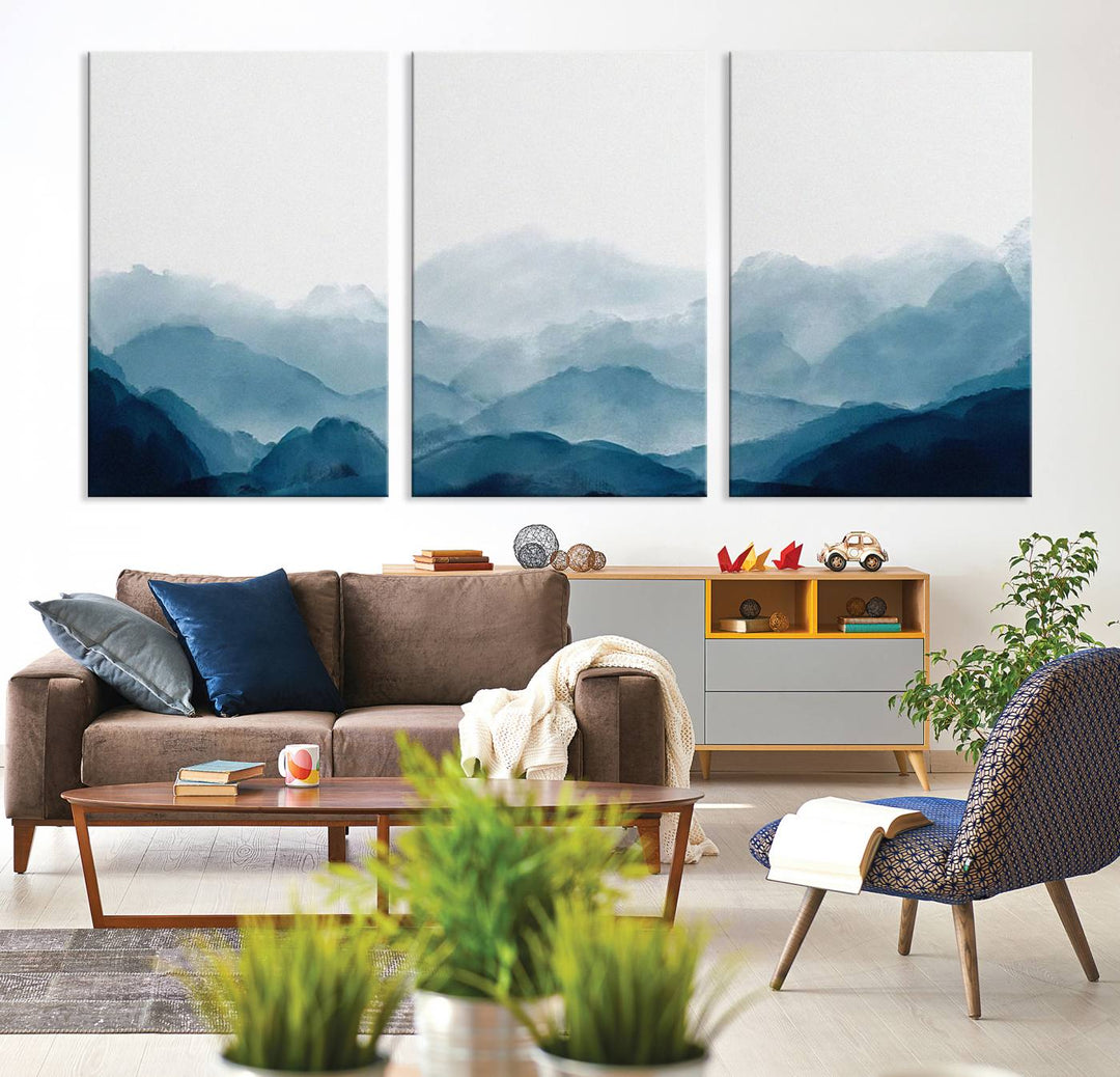 A modern living room features a three-panel canvas of green forest nature scenery photography on the wall. The artwork is gallery wrapped in museum-quality canvases, ensuring both durability and an exquisite display.