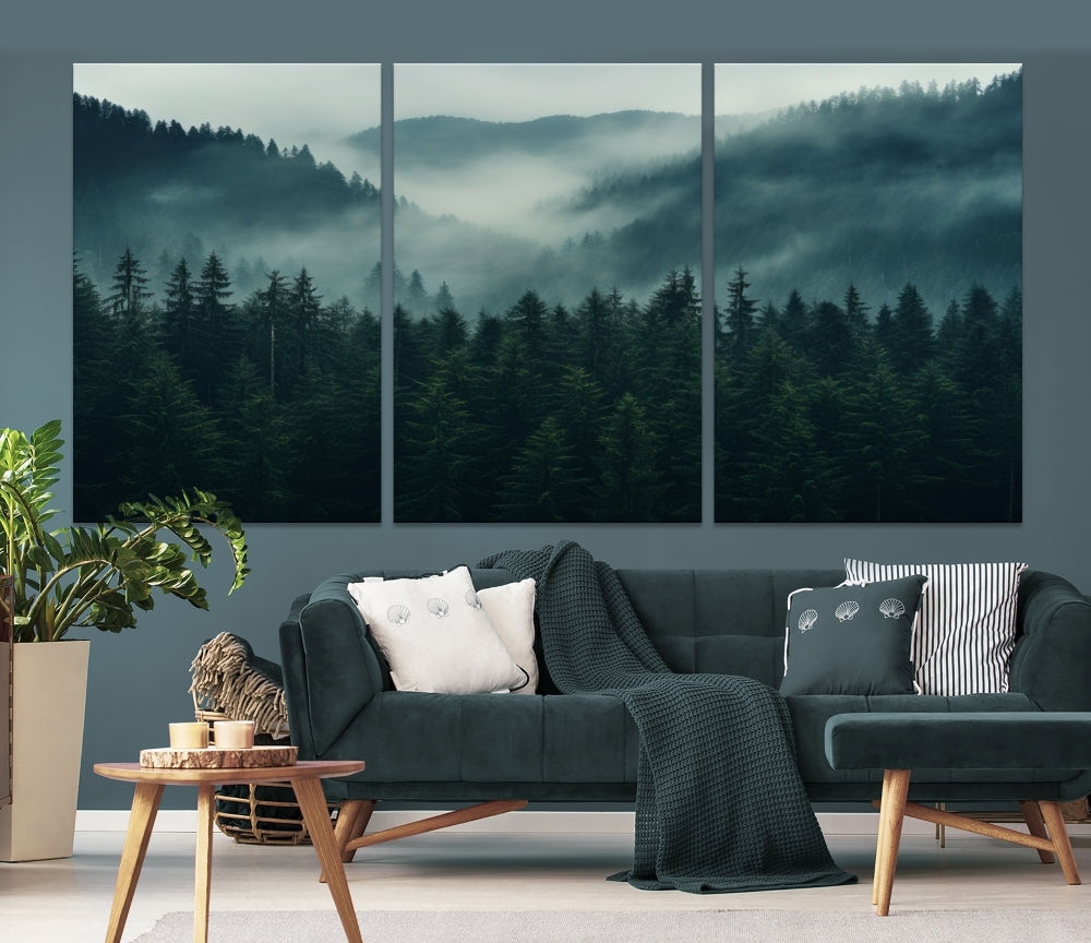 The Captivating Misty Forest Wall Art Premium Canvas Print adds a foggy and serene atmosphere to the living room with its large triptych on gallery-wrapped museum-quality canvas.