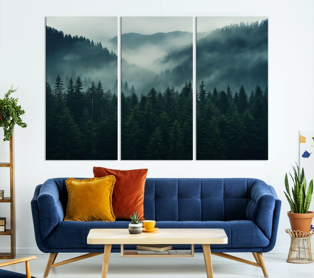 The Captivating Misty Forest Wall Art Premium Canvas Print adds a foggy and serene atmosphere to the living room with its large triptych on gallery-wrapped museum-quality canvas.