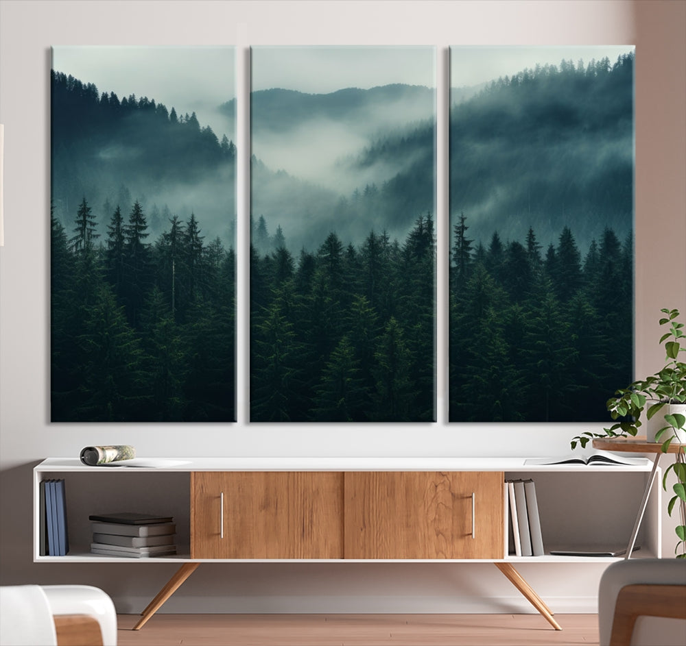 The Captivating Misty Forest Wall Art Premium Canvas Print adds a foggy and serene atmosphere to the living room with its large triptych on gallery-wrapped museum-quality canvas.