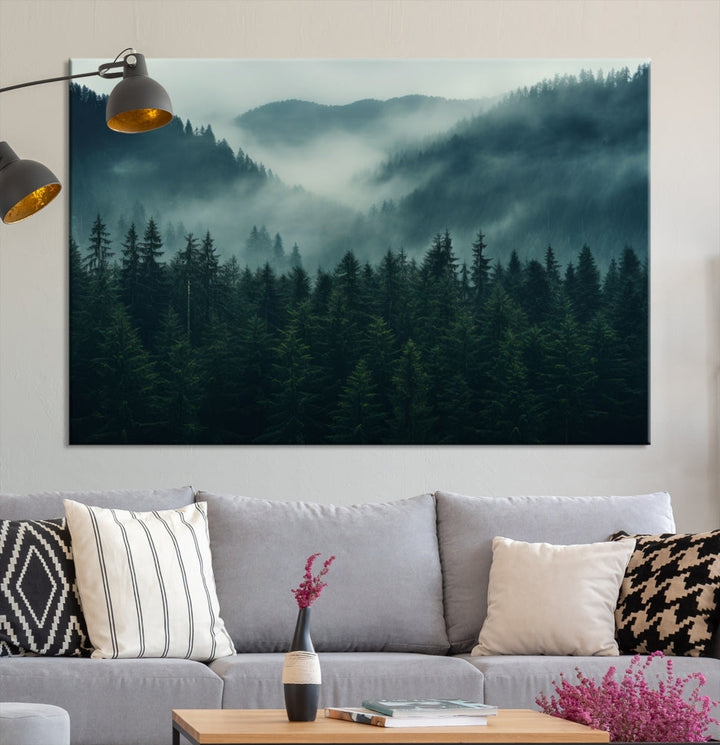 The Captivating Misty Forest Wall Art Premium Canvas Print adds a foggy and serene atmosphere to the living room with its large triptych on gallery-wrapped museum-quality canvas.