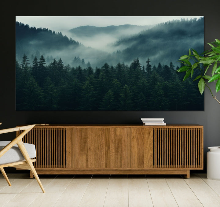 The Captivating Misty Forest Wall Art Premium Canvas Print adds a foggy and serene atmosphere to the living room with its large triptych on gallery-wrapped museum-quality canvas.