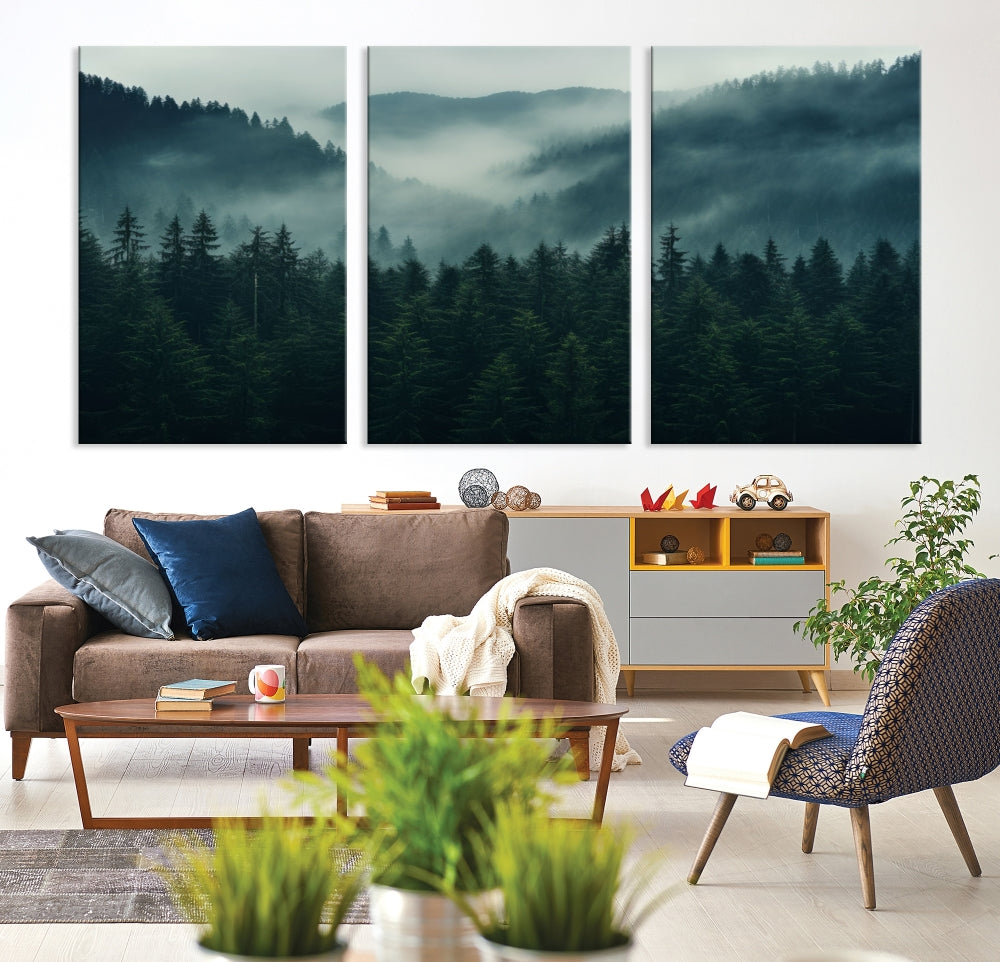 The Captivating Misty Forest Wall Art Premium Canvas Print adds a foggy and serene atmosphere to the living room with its large triptych on gallery-wrapped museum-quality canvas.