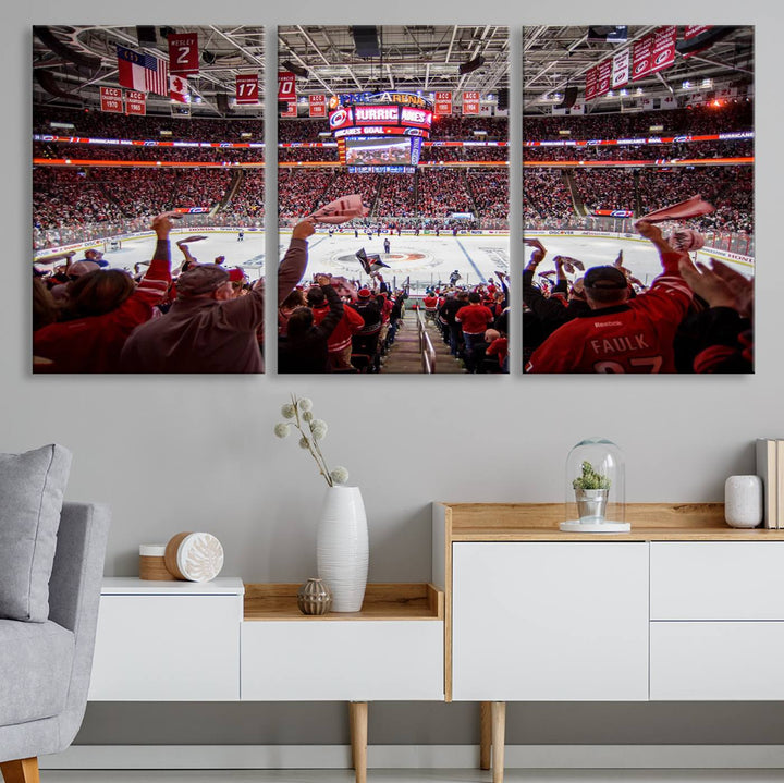 A museum-quality canvas print captures the excitement of hockey enthusiasts cheering in a bustling arena. This artwork provides a vibrant depiction of the Carolina Hurricanes Ice Hockey Stadium.